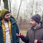 Two men engaging in conversation