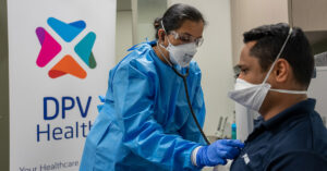 A GP assessing a patient for respiratory symptoms at the new DPV Health GP Respiratory Clinic.