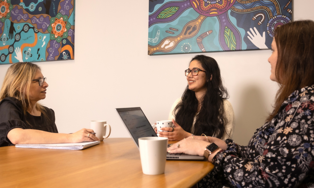 Mental health team sitting at a table