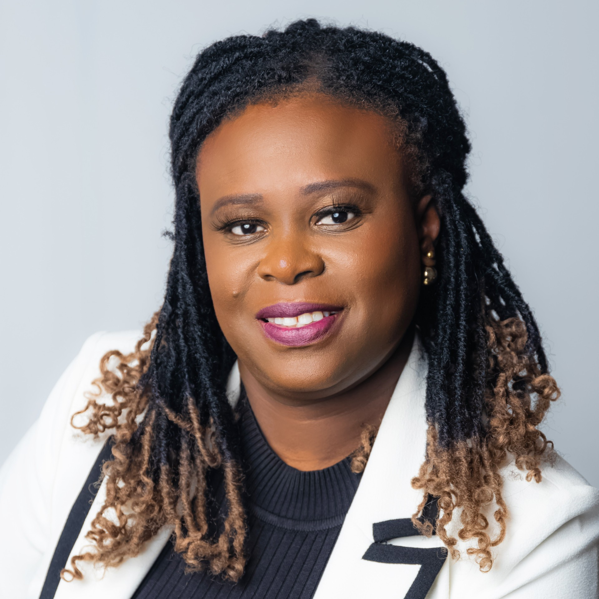 Portrait photograph of Abiola Akinbiyi