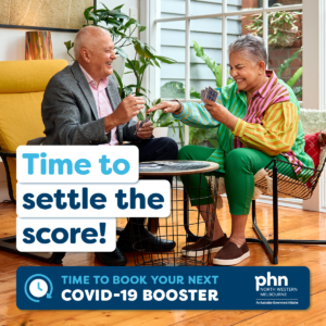 An older couple play cards together.